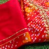 Dazzling Orange Red Bandhini Outfit