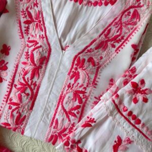 Close-up of the Beautiful White Chikankari Set in Shaded Pink featuring intricate handcrafted Chikankari embroidery on the neckline and sleeves.