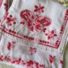Layered modal palazzo from the Beautiful White Chikankari Set in Shaded Pink featuring intricate handcrafted pink Chikankari embroidery and floral motifs.