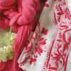 Side view of the Beautiful White Chikankari Set in Shaded Pink showcasing handcrafted pink Chikankari embroidery on the kurta and matching bottom.
