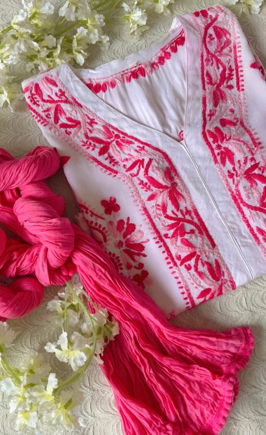 Beautiful White Chikankari Set in Shaded Pink 1 Beautiful White Chikankari Set in Shaded Pink with handcrafted Chikankari embroidery and matching pink cotton Chuna dupatta.