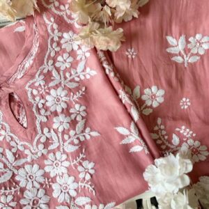 Charming rose peach muslin chikankari kurta set folded view