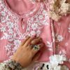 Charming rose peach muslin chikankari kurta set folded view