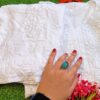 Exquisite white modal chikankari outfit showing kurti and pant folded view