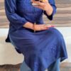 Mesmerizing Mukaish Chikankari Kurti with Denims 11 Mesmerizing Mukaish Chikankari Kurti with Denims styled in a sitting front pose