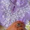 Radiant Lilac Lavender Muslin Chikankari Kurta Set folded embroidery view highlighting intricate handcrafted Chikankari detailing