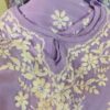 Radiant Lilac Lavender Muslin Chikankari Kurta Set folded front view featuring intricate Chikankari embroidery