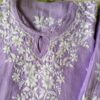 Radiant Lilac Lavender Muslin Chikankari Kurta Set folded neckline view featuring intricate handcrafted Chikankari embroidery