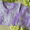 Radiant Lilac Lavender Muslin Chikankari Kurta Set folded view with elegant hand-embroidered detailing