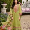 Woman wearing Stunning Embroidered Cotton Suit with Floral Dupatta in a standing pose