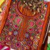 Stunning Burnt Orange Embroidered Kurta Set Folded View