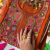 Stunning Burnt Orange Embroidered Kurta Set Folded View