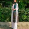 Model standing in luxurious white modal chikankari kurti pant set with statement green chiffon dupatta
